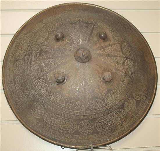 An Indo Persian chiselled steel circular dhal,